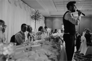 Singing waiter sings in front of the Bride and Groom