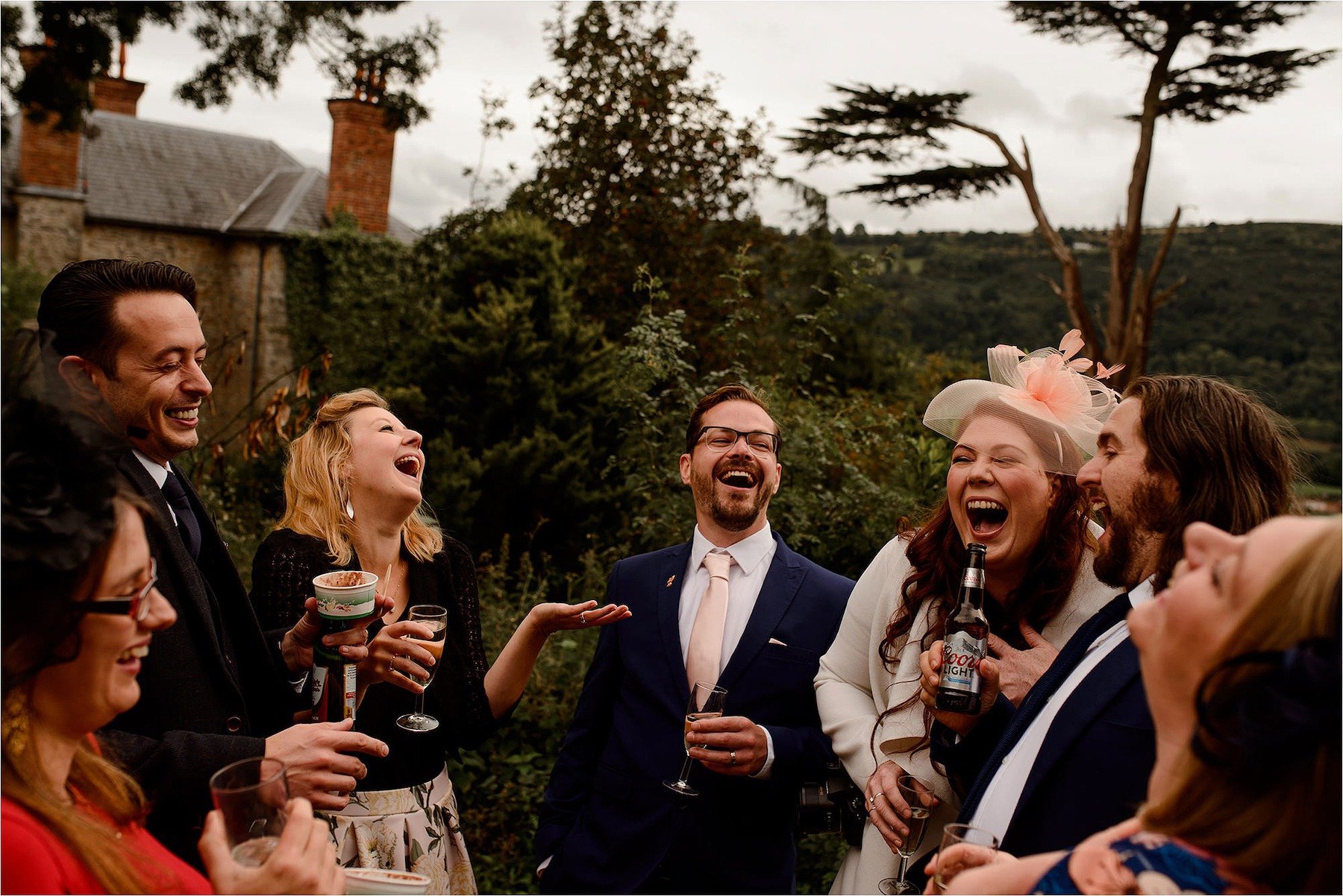 Guests laughing during the drinks reception