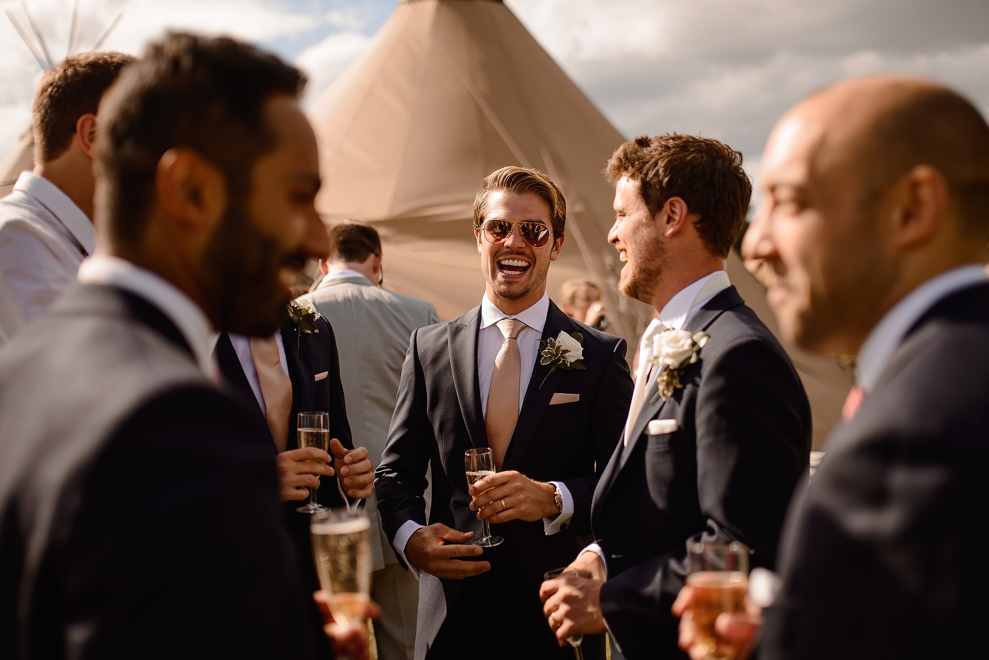 Wedding Guests laughing during the drinks reception