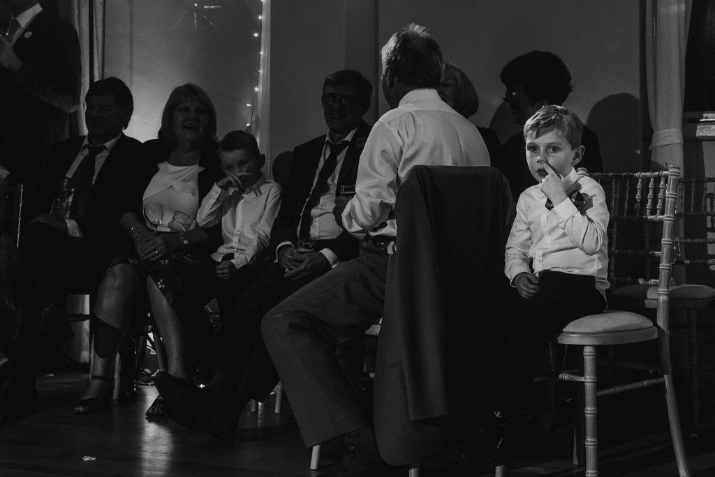 Young boy picking his nose