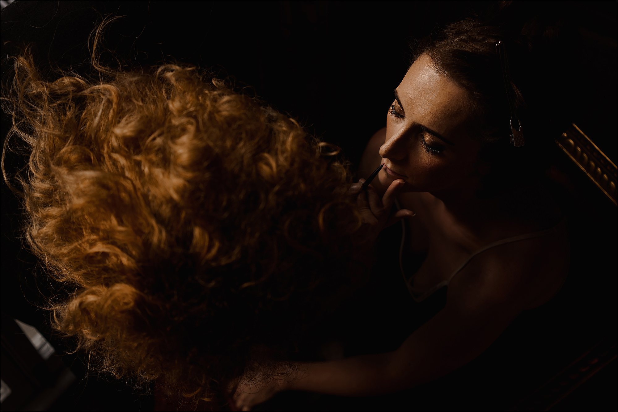 Bride having her make up done