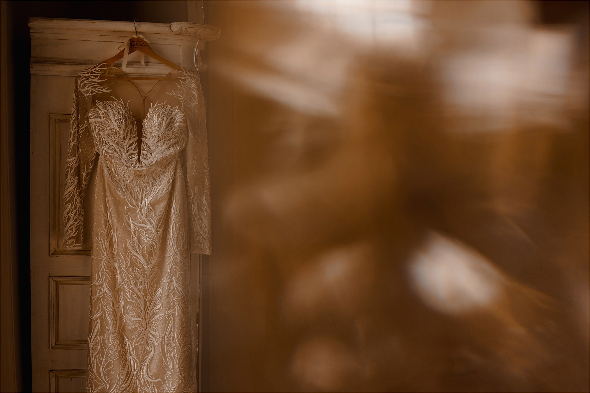 Wedding dress hanging up