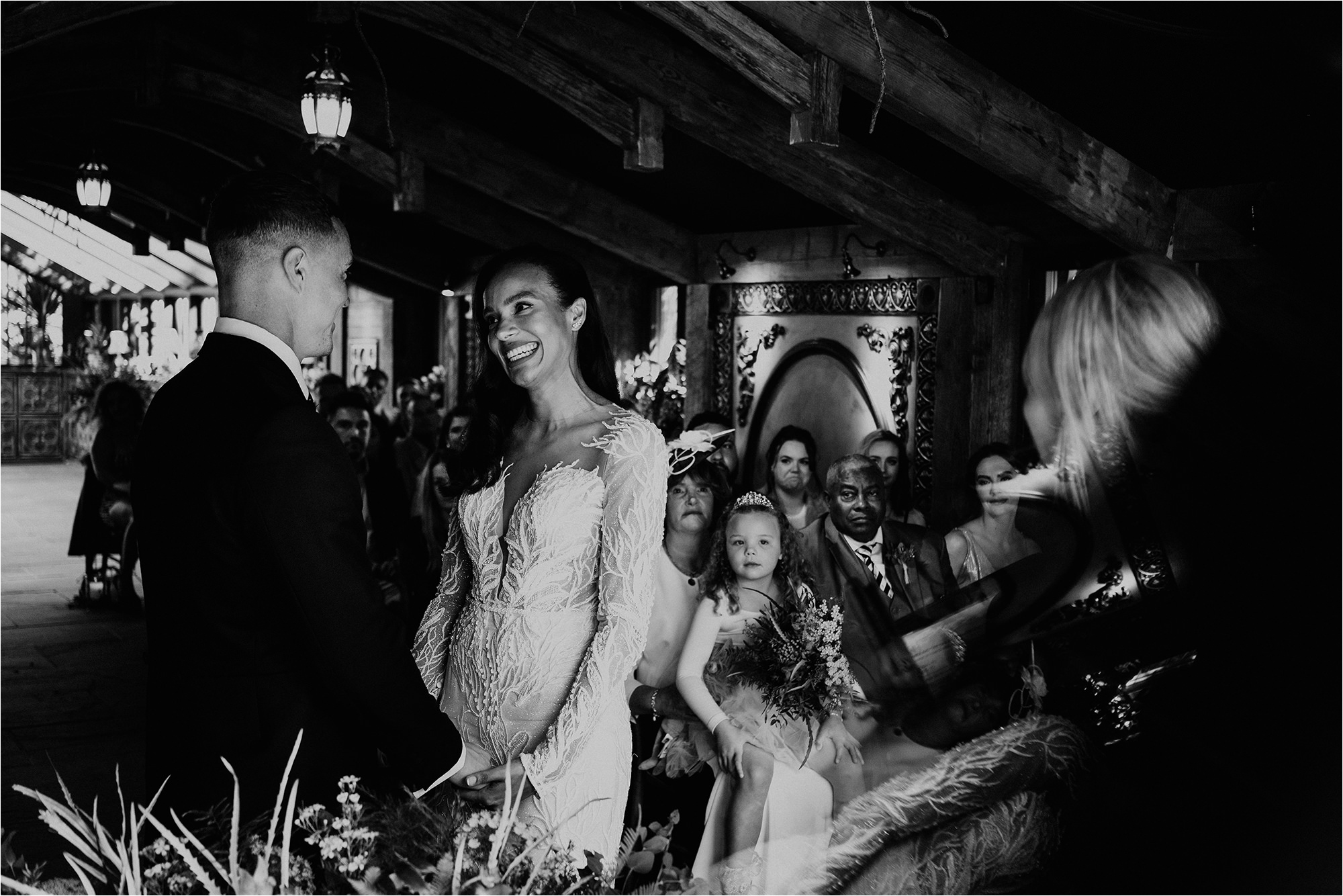 Bride and Groom smiling at each other