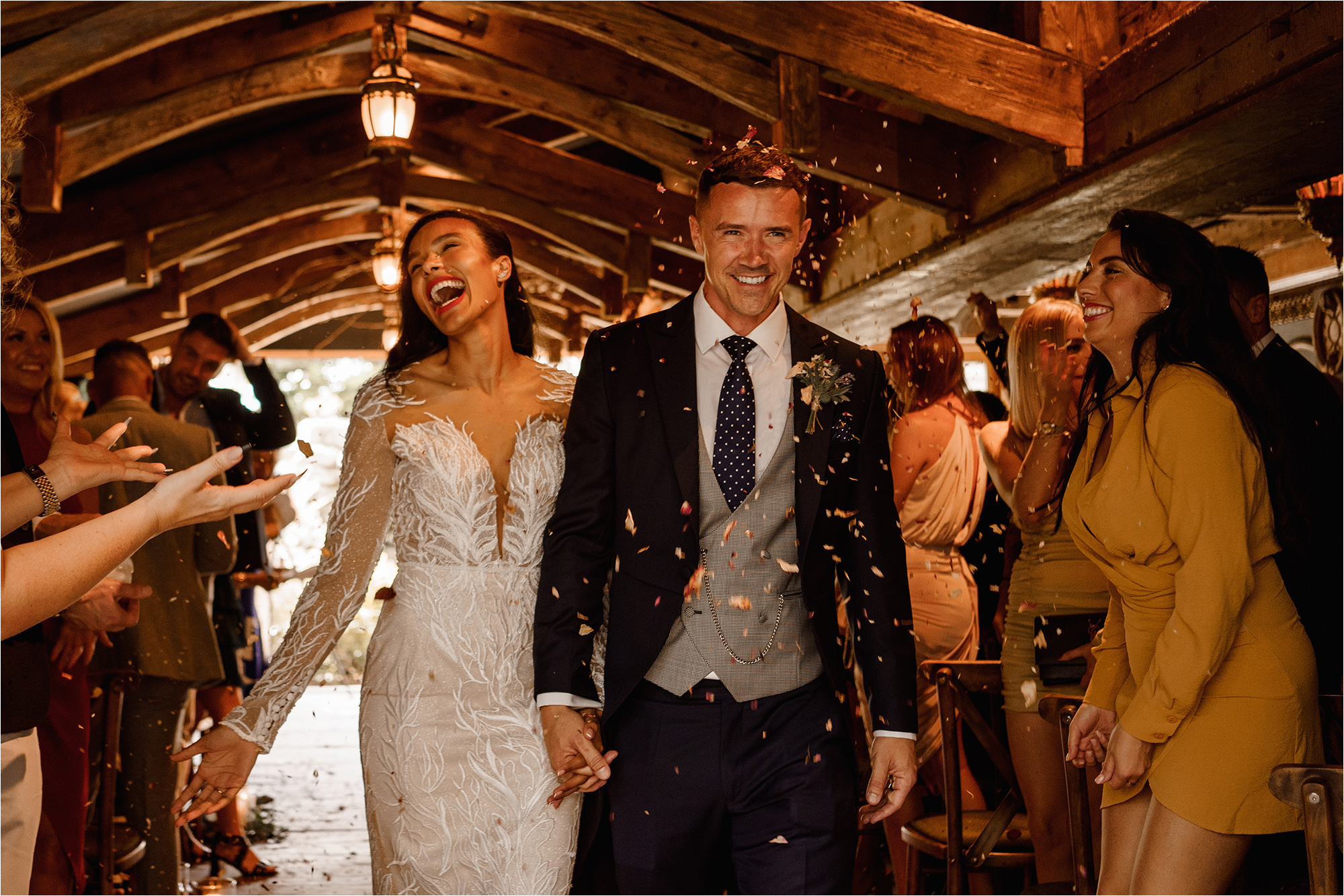 Bride and Groom walking up the aisle after their wedding ceremony