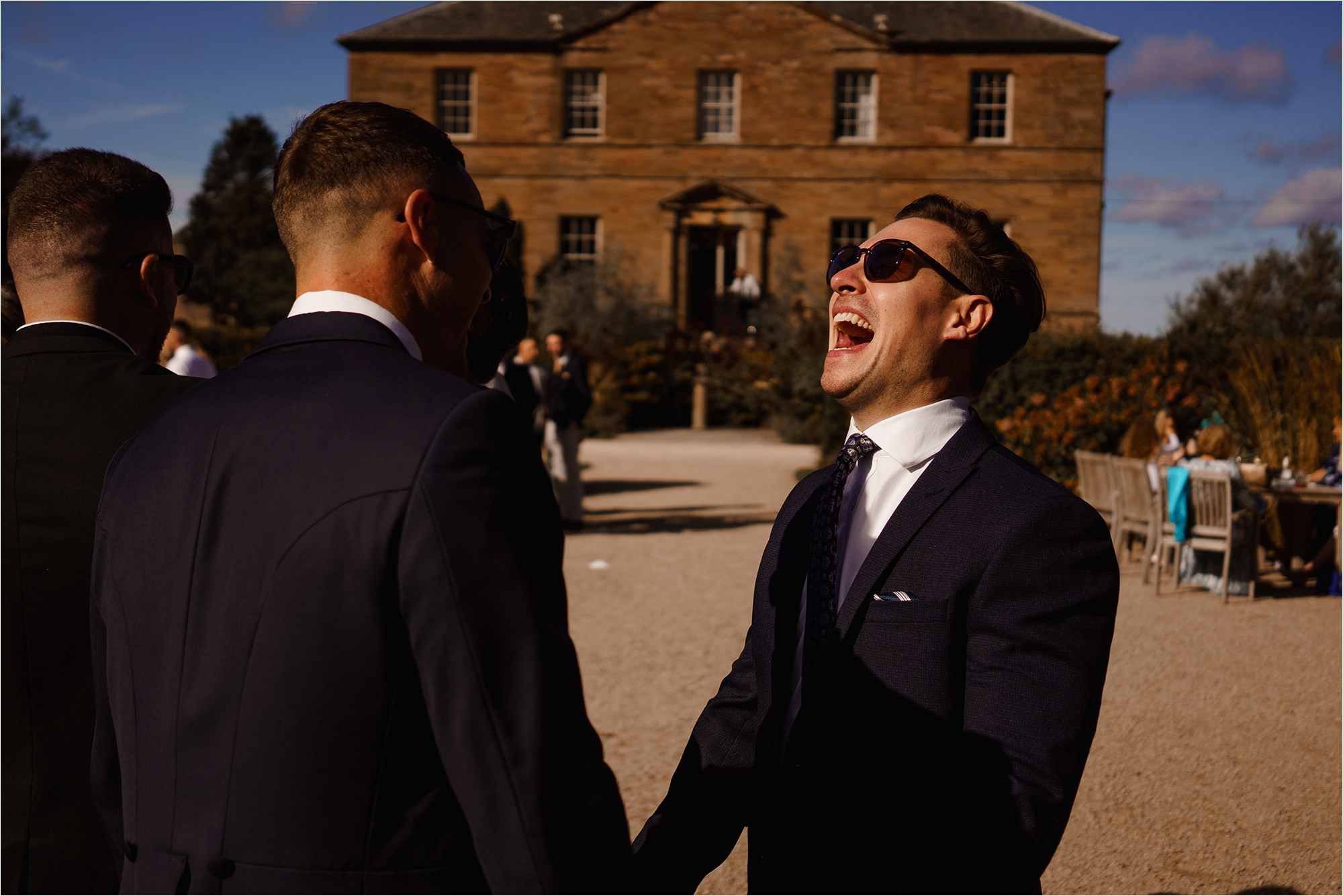 Wedding Guests chatting and laughing