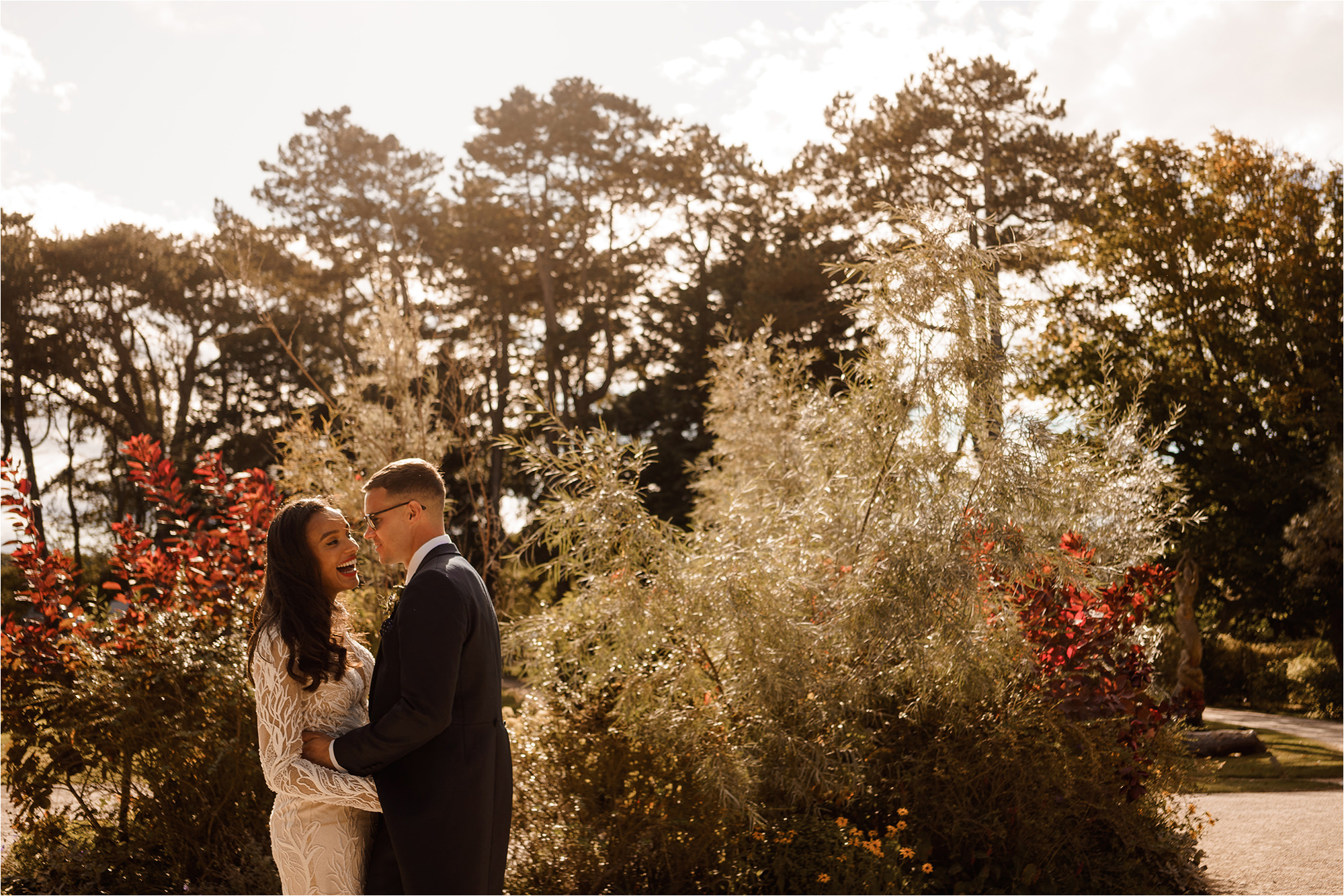 Bride and Groom laughing and looking at each other