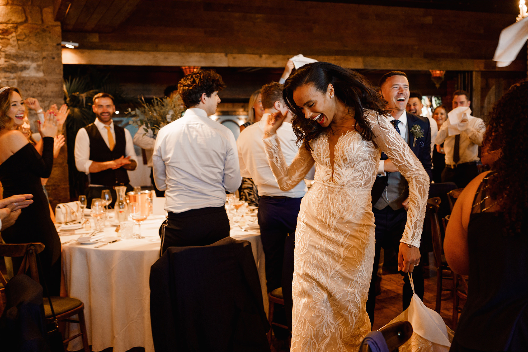 Bride dancing through the room