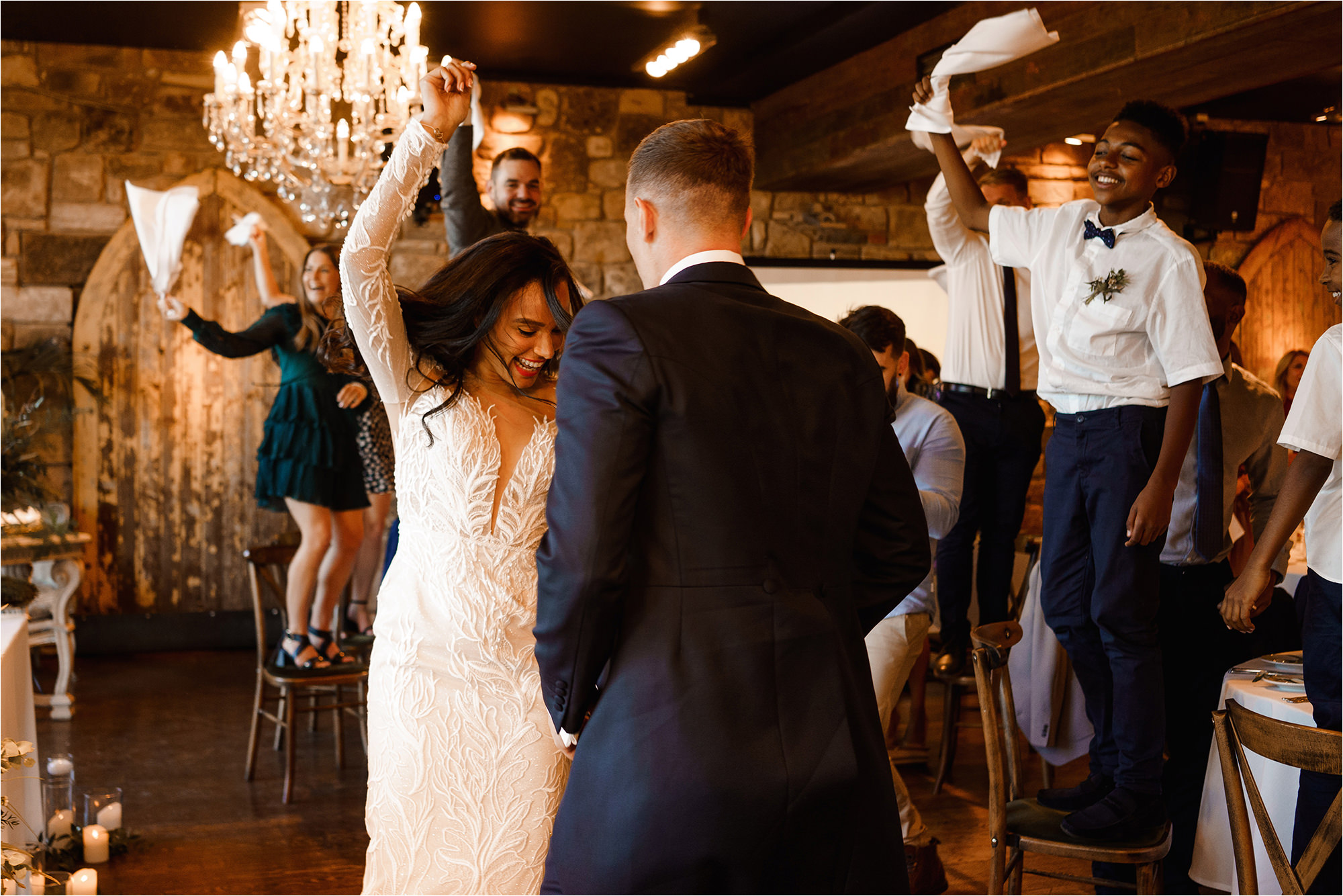 Bride and Groom dancing together in the reception room