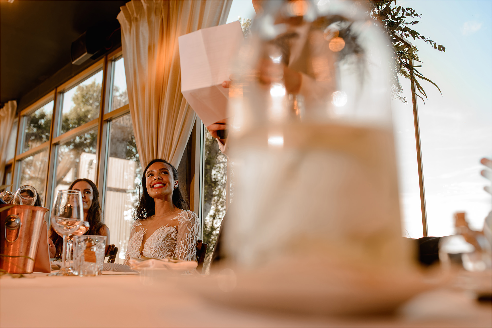 Bride watching the Groom do his speech