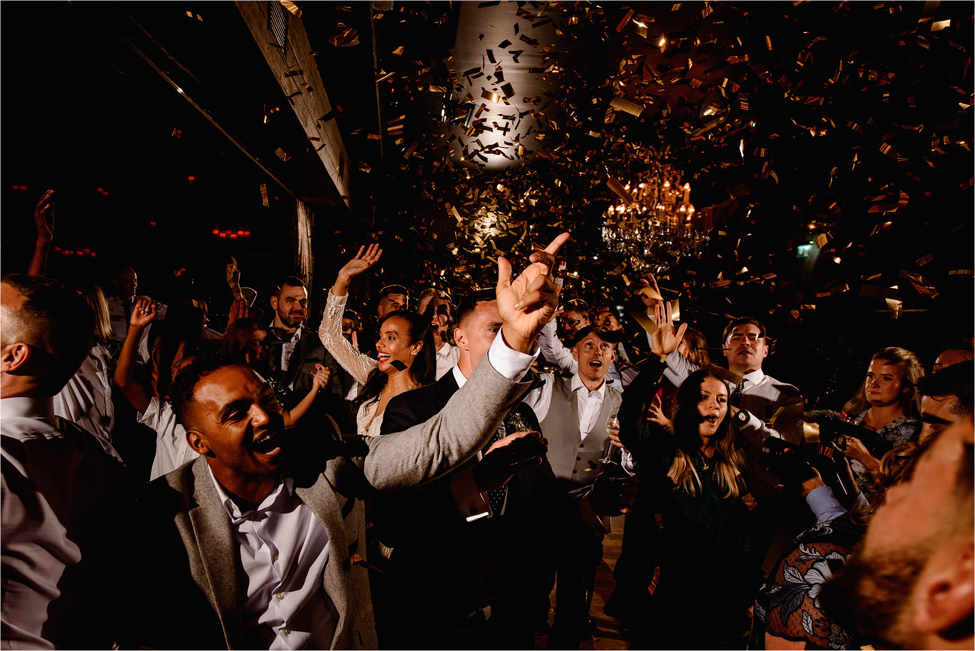 Wedding Guests on the dance floor with confetti