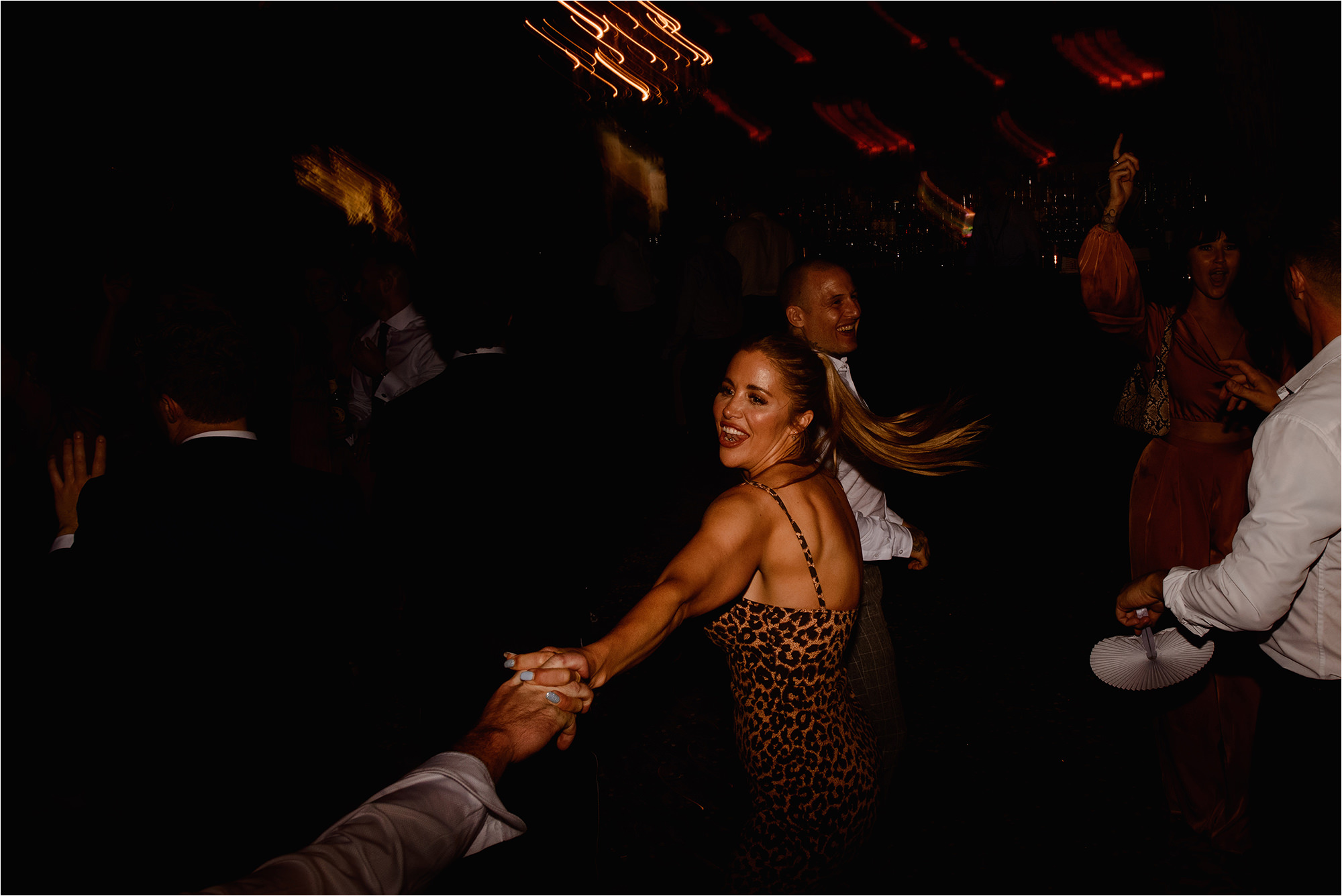 Wedding Guests laughing and dancing