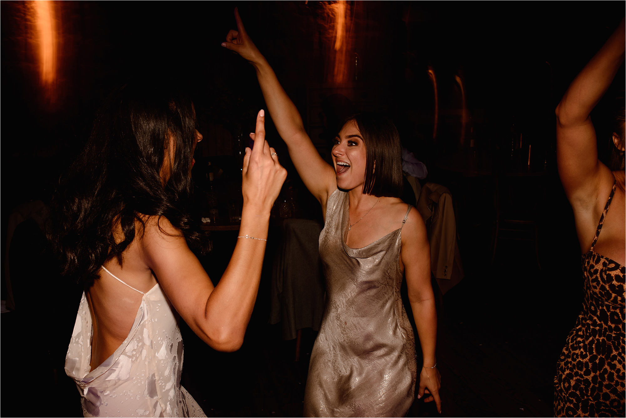 Bride and Bridesmaid dancing on the dance floor