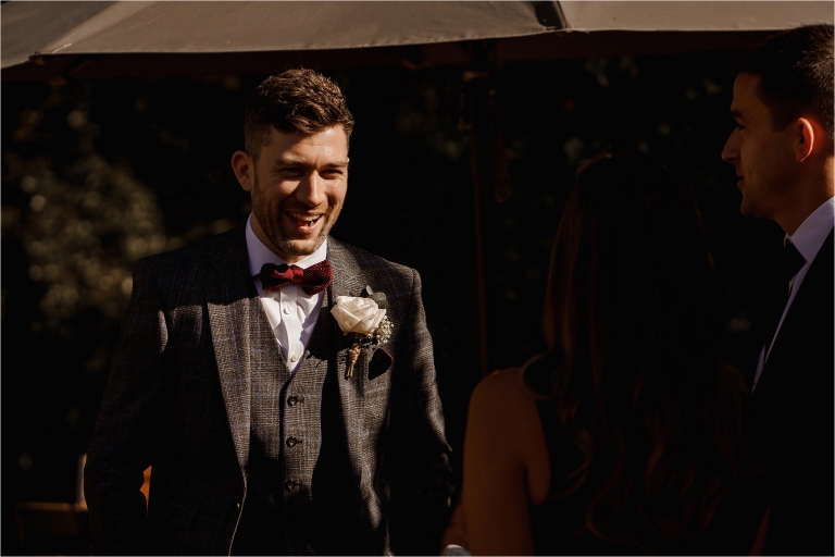 Groom laughing