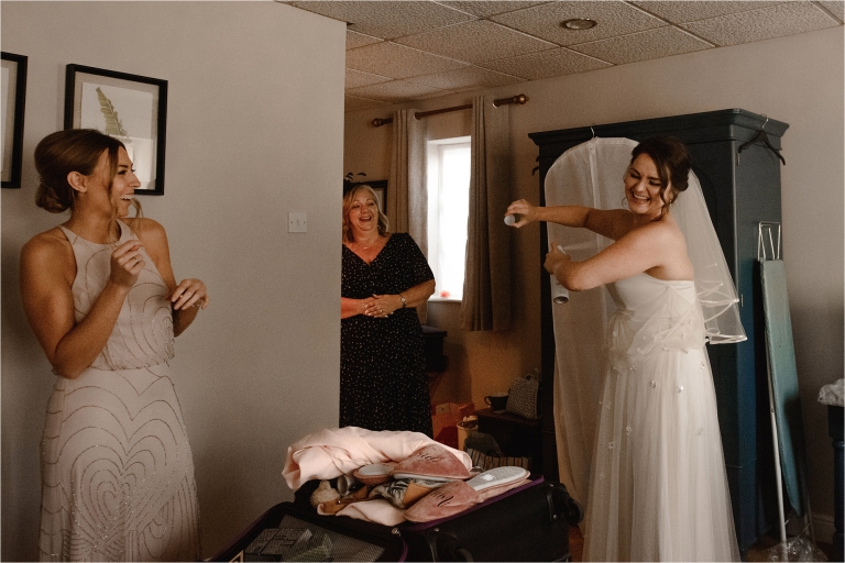 Bride and Bridesmaids laughing