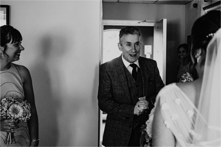 Father of the Bride seeing Bride in her dress for the first time