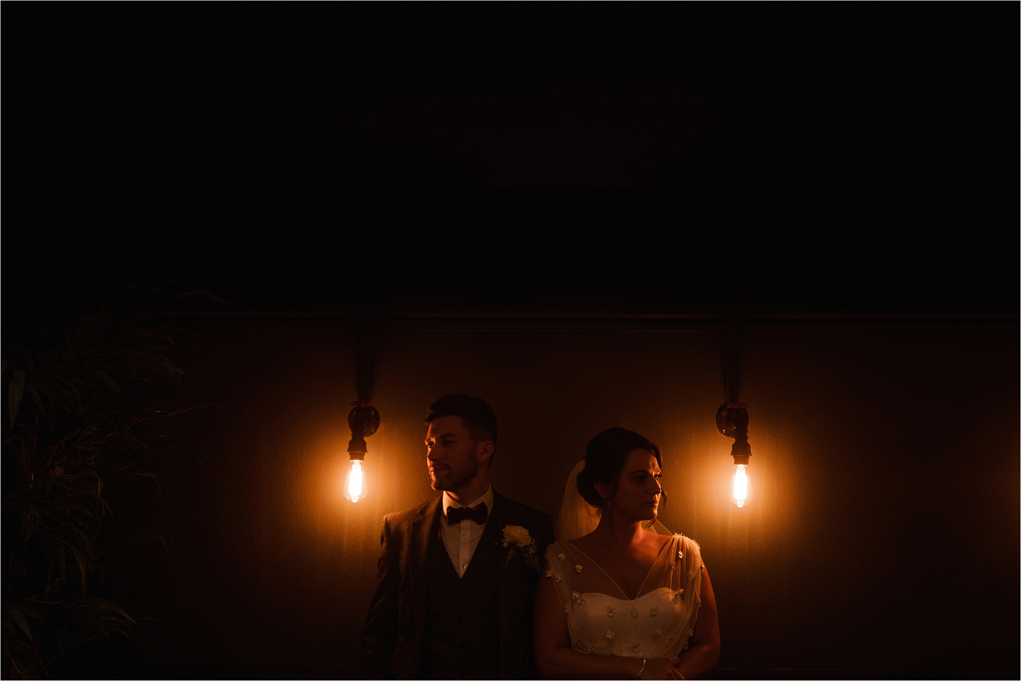 Dark wedding portrait photo of the Bride and Groom at The Bridge Prestbury