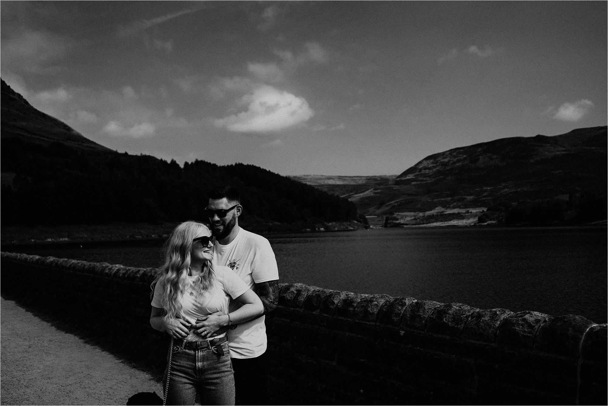 Bride and Groom together with reservoir in background