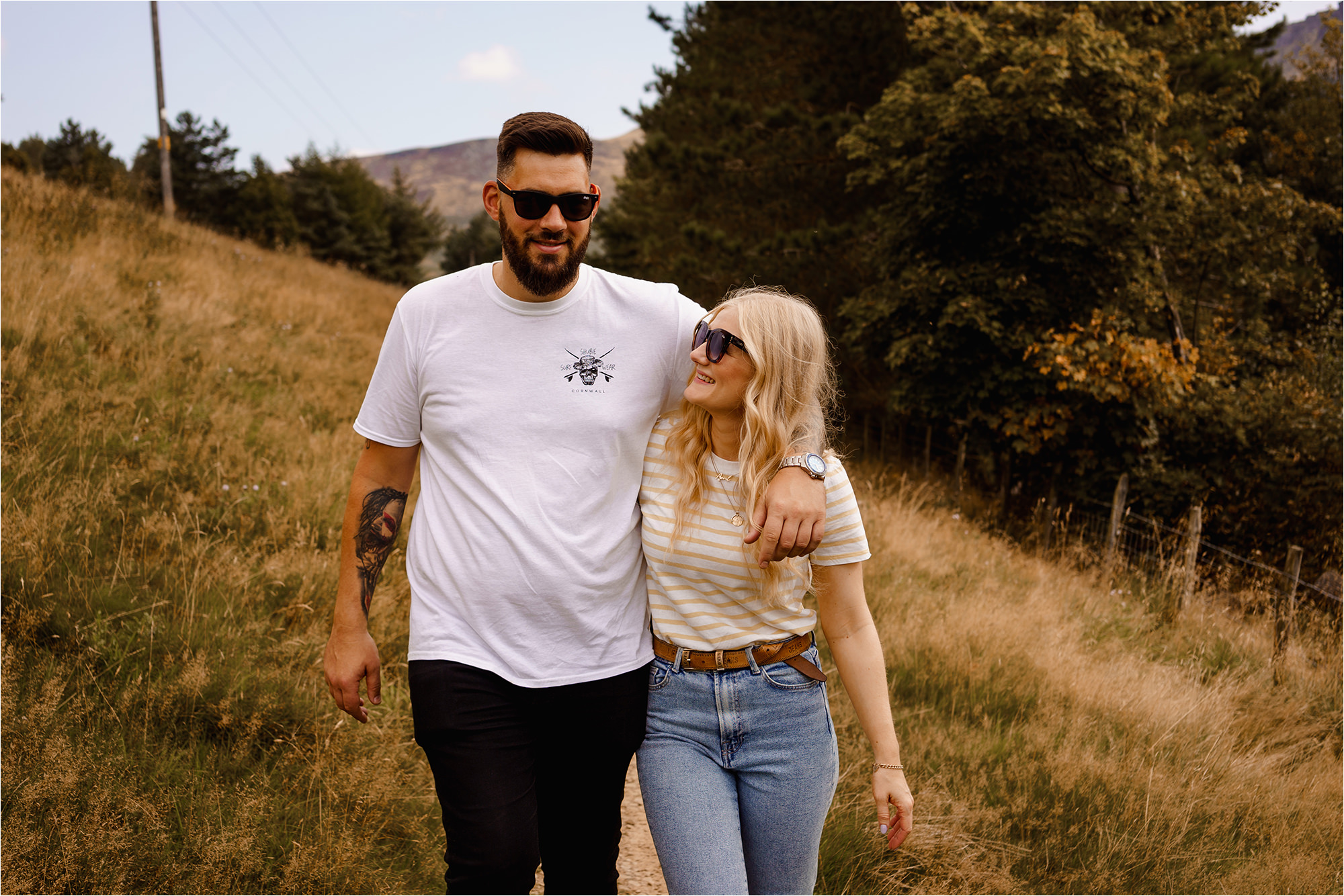 Couple walking towards camera