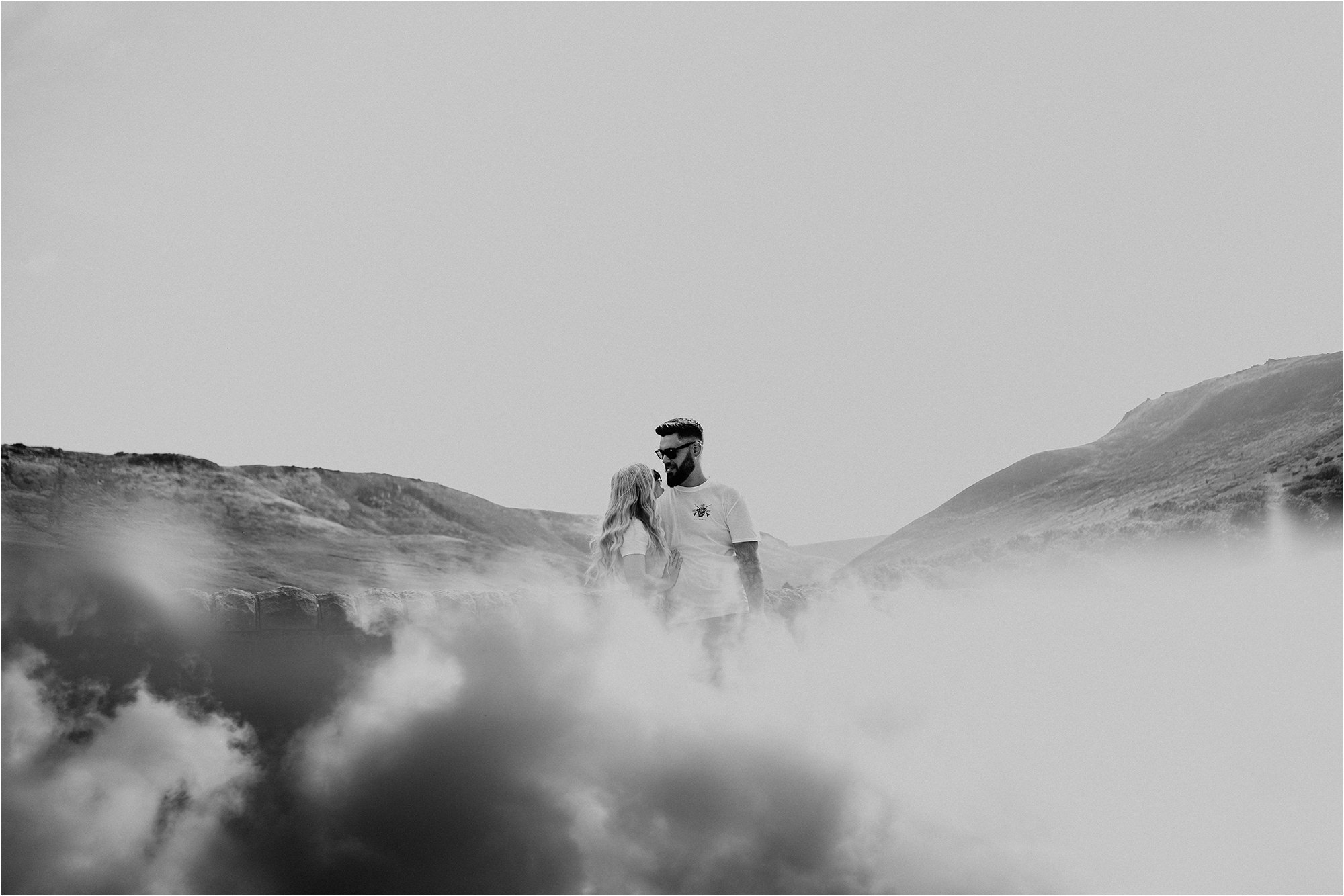 Black and White image of the couple with sky reflected