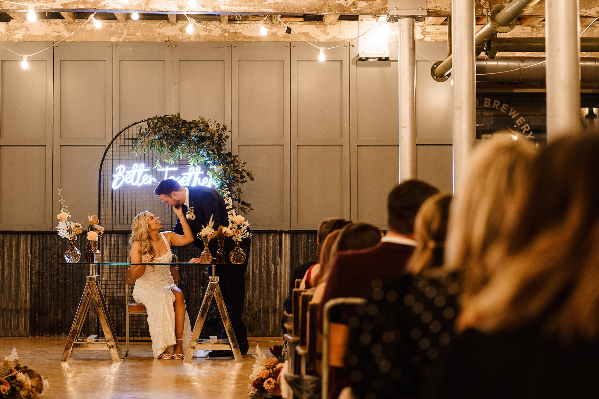 Bride and Groom signing the register