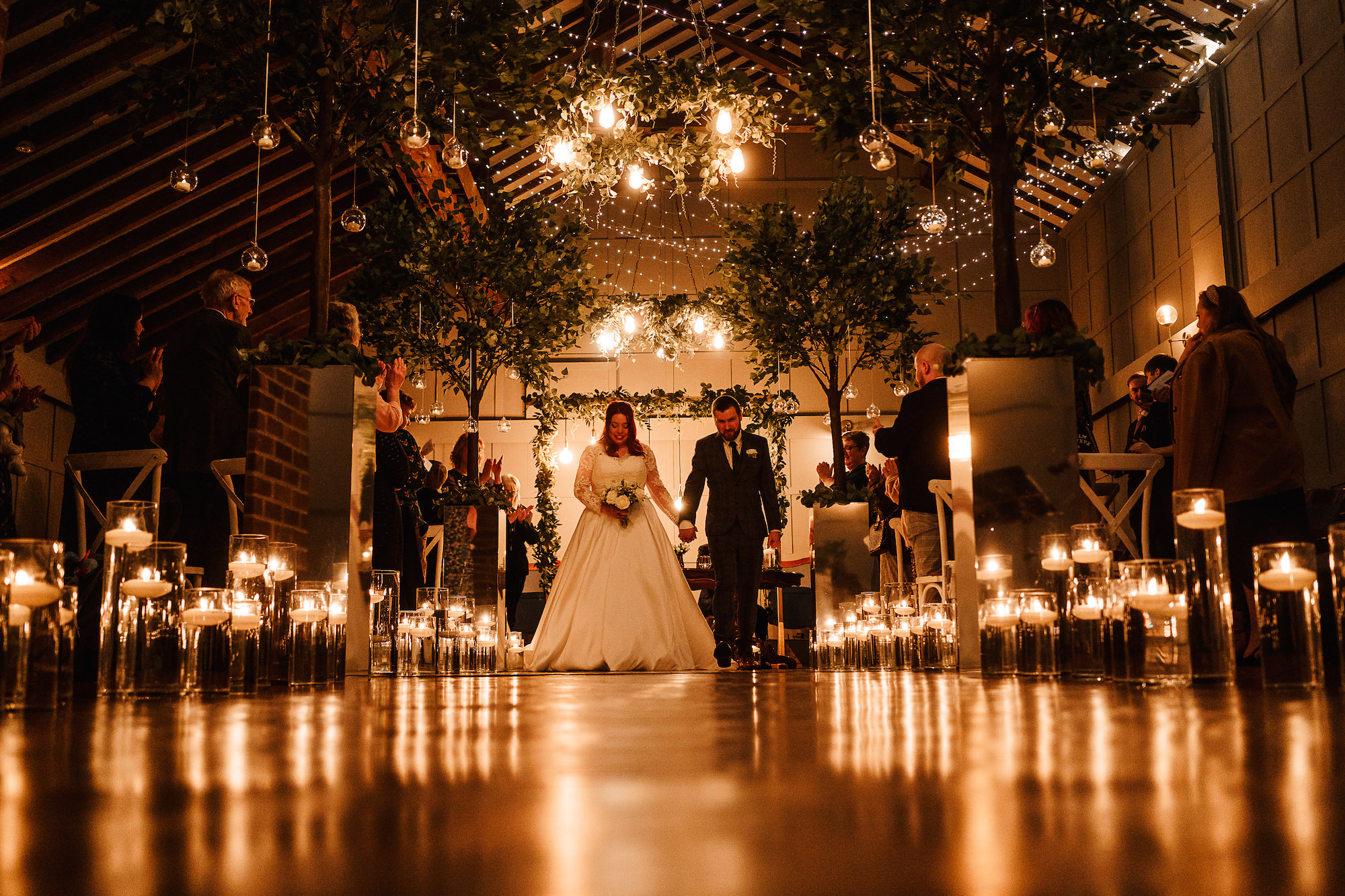 Bride and Groom walking up the aisle