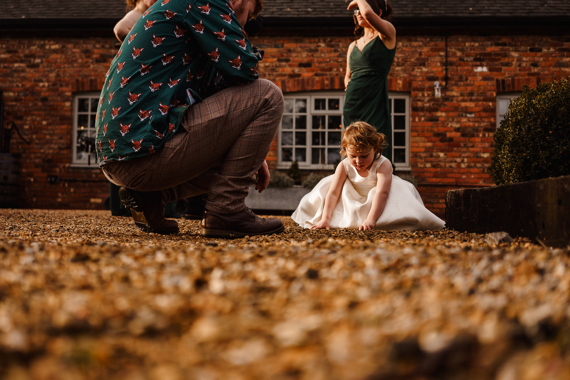 Flower Girl picking stones up