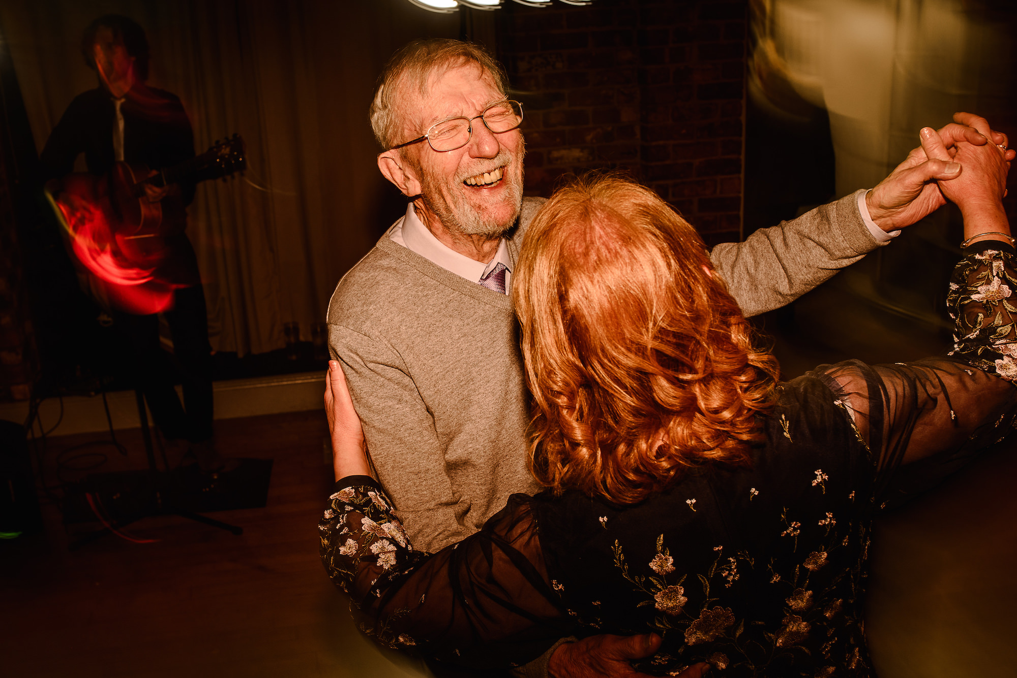 Mother of the Bride dancing with Wedding Guests